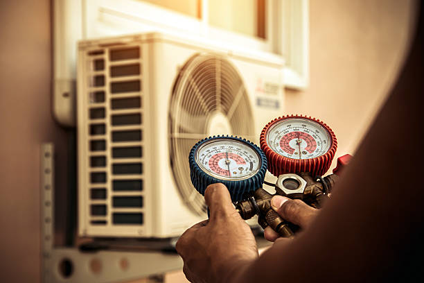 Professional Heat Pump Repair technician working in Perryville, MO